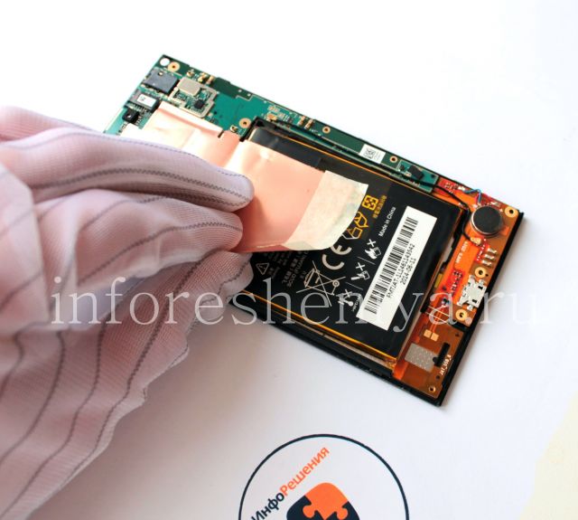 BlackBerry Z3 Take Apart (Disassembly, Teardown): Take off the sticker by your hands.