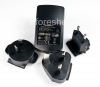 Photo 2 — Original universal wall charger with attachments for different countries, The black