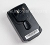 Photo 4 — Original universal wall charger with attachments for different countries, The black
